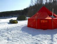 Зимняя палатка с печкой: особенности эксплуатации